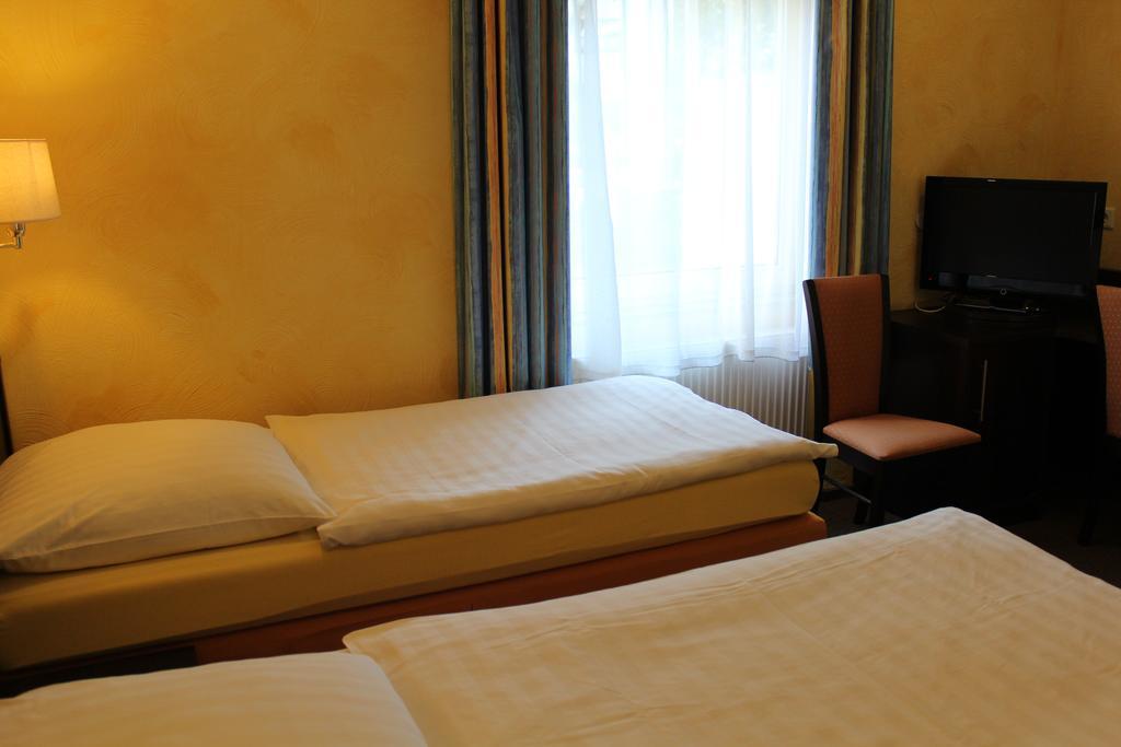 Hotel Rosenhof Дюссельдорф Номер фото
